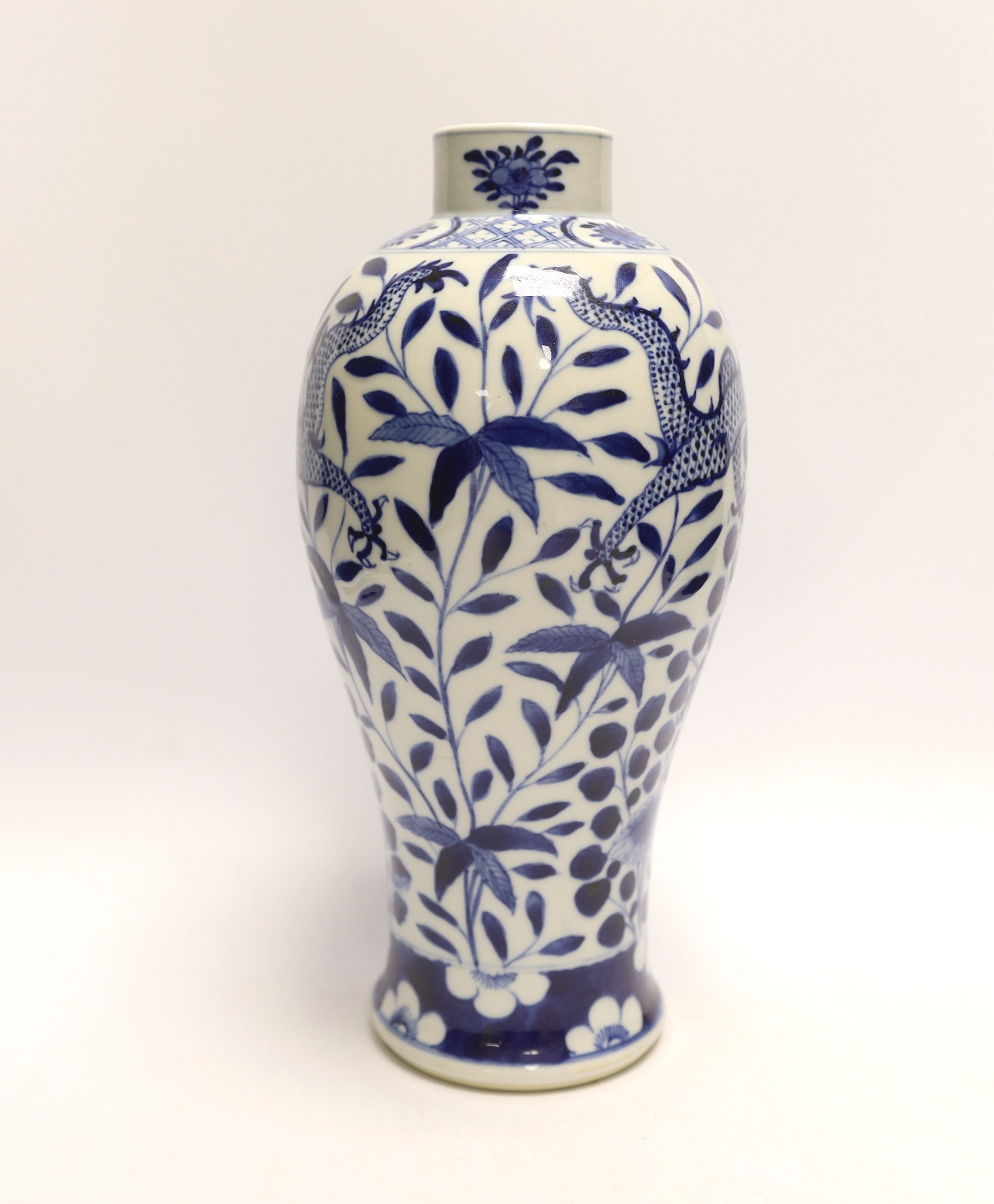 A Chinese blue and white ‘dragon’ vase, circa 1900, 35cm high